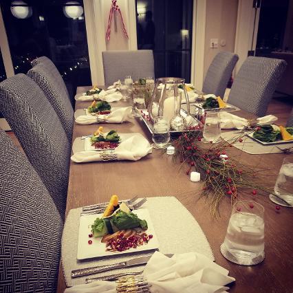 Table setting for 12 guests for a family Christmas dinner
